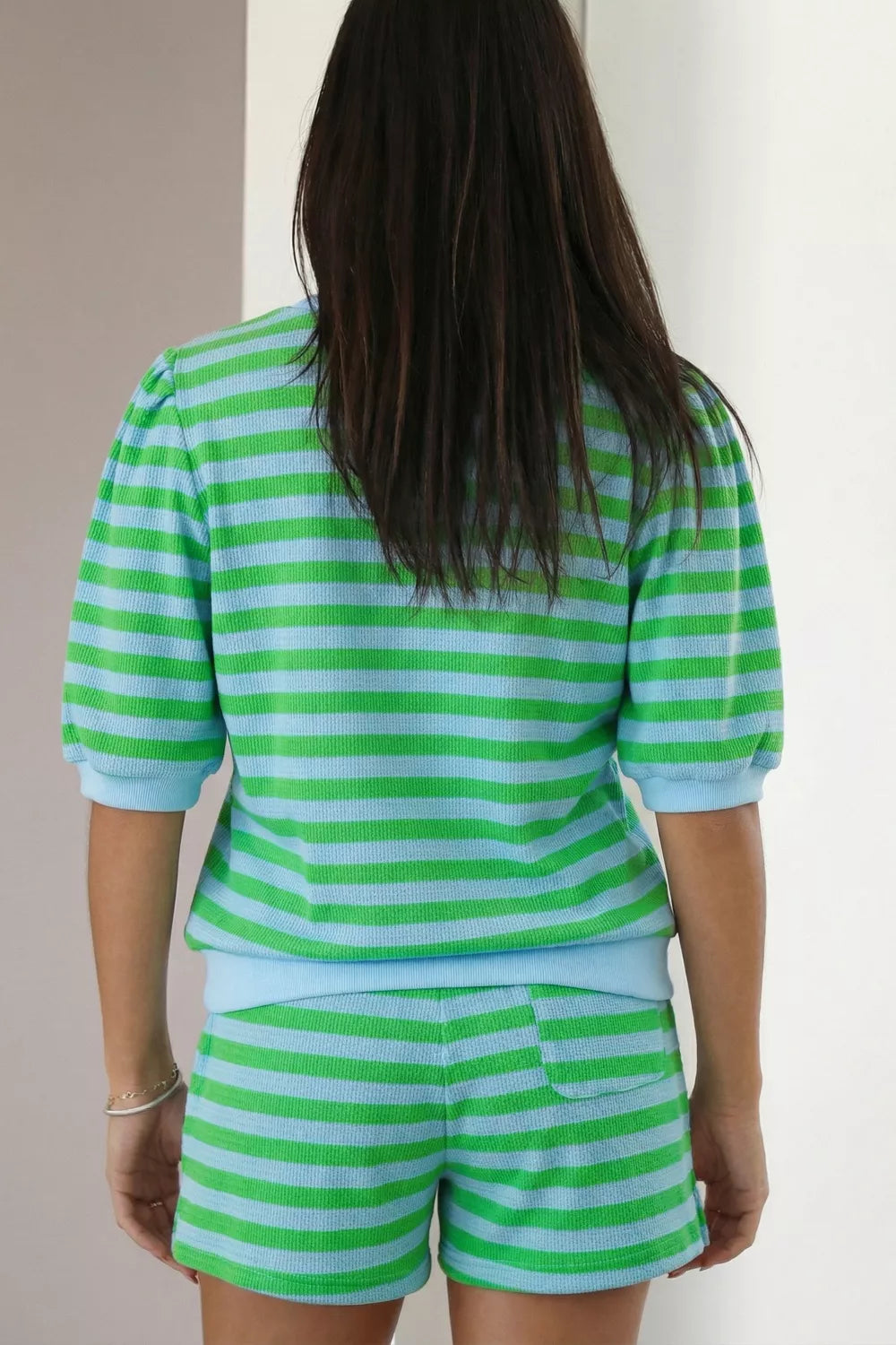 Colorblock puff sleeve top and drawstring shorts matching set by Plush Fashion Hub, showcasing vibrant colors and stylish design.