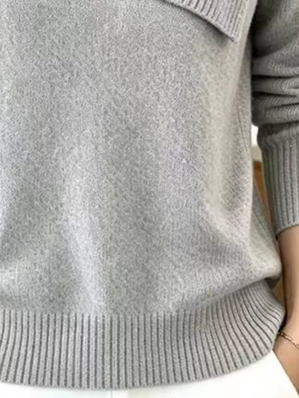 Plus size trendy ribbed collar sweater with asymmetric design, featuring a cozy knit texture and stylish fit from Trendsi.
