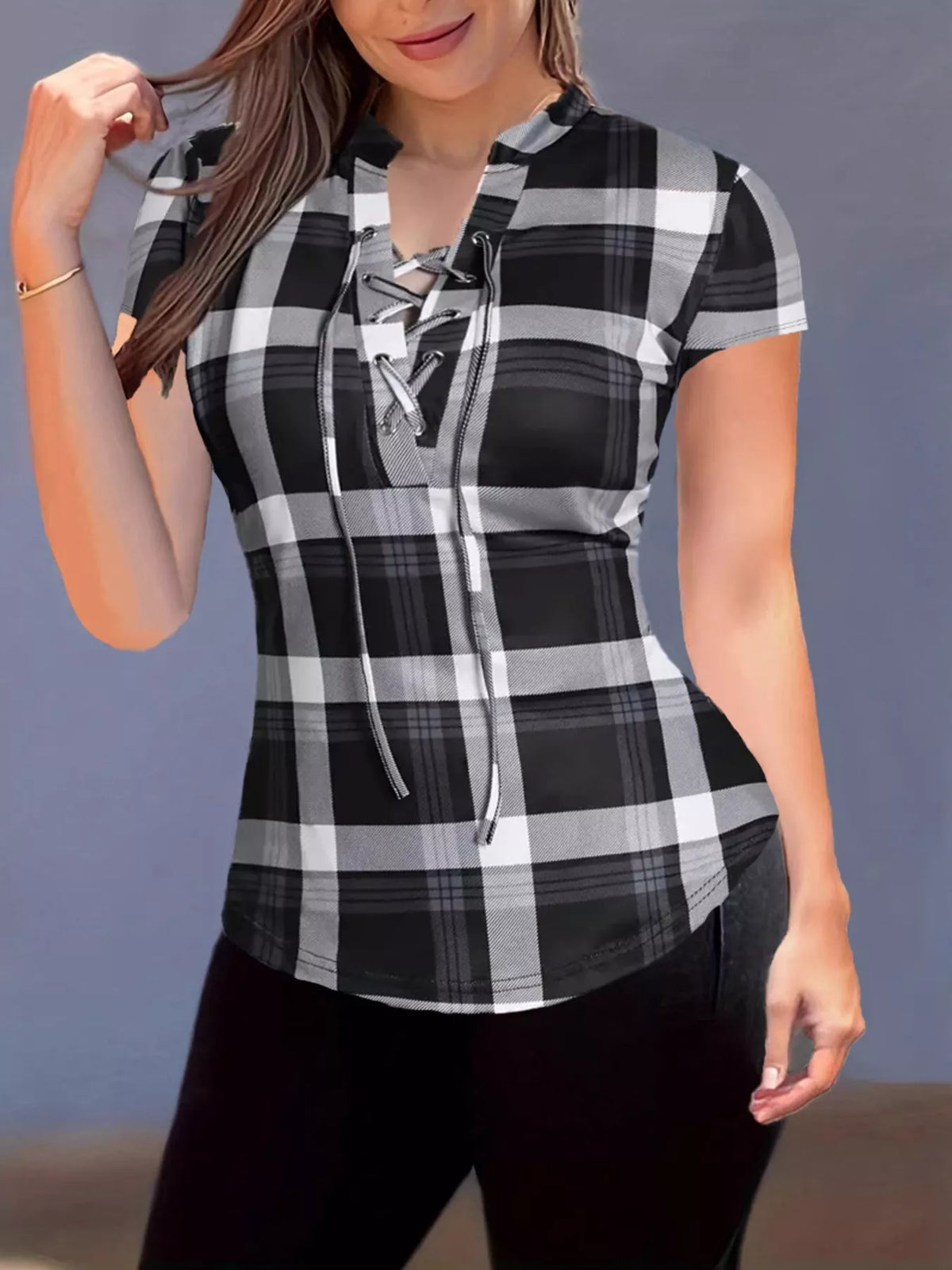Plaid lace-up short sleeve blouse by Plush Fashion Hub featuring a stylish design and lightweight fabric.