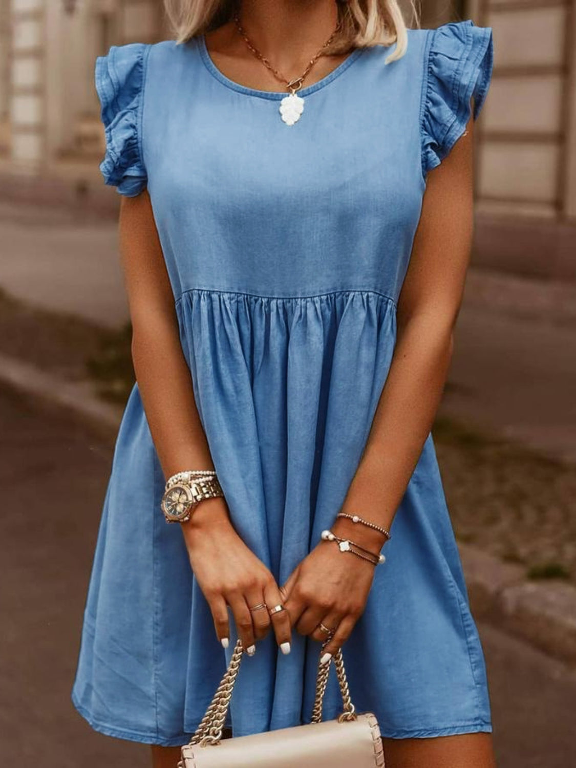 Full size ruffled round neck cap sleeve denim dress by Plush Fashion Hub, showcasing the stylish design and ruffled neckline.