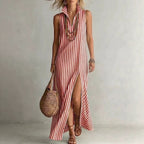 Striped sleeveless maxi dress with stand collar, side slit, and A-line shape from FitiqueFit casualwear collection.