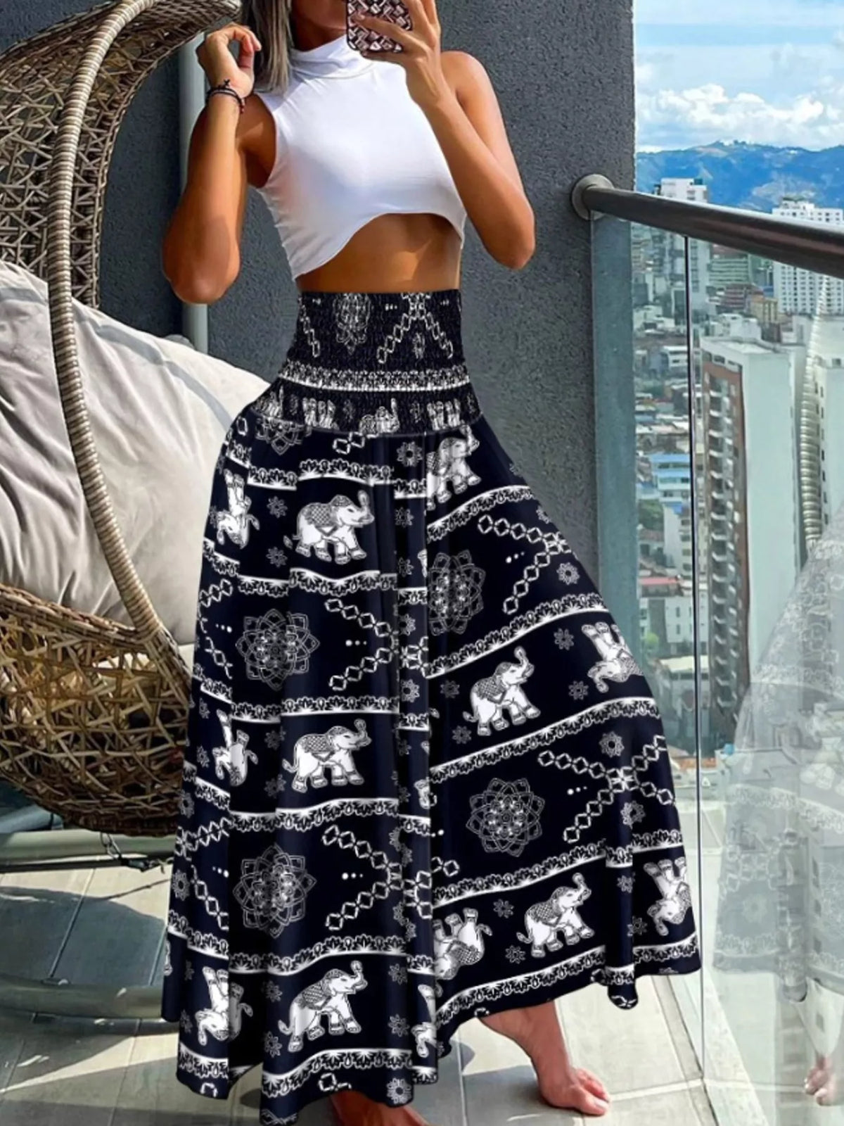 Printed wide-leg pants from Plush Fashion Hub featuring a colorful, abstract pattern and flowing, comfortable fabric.