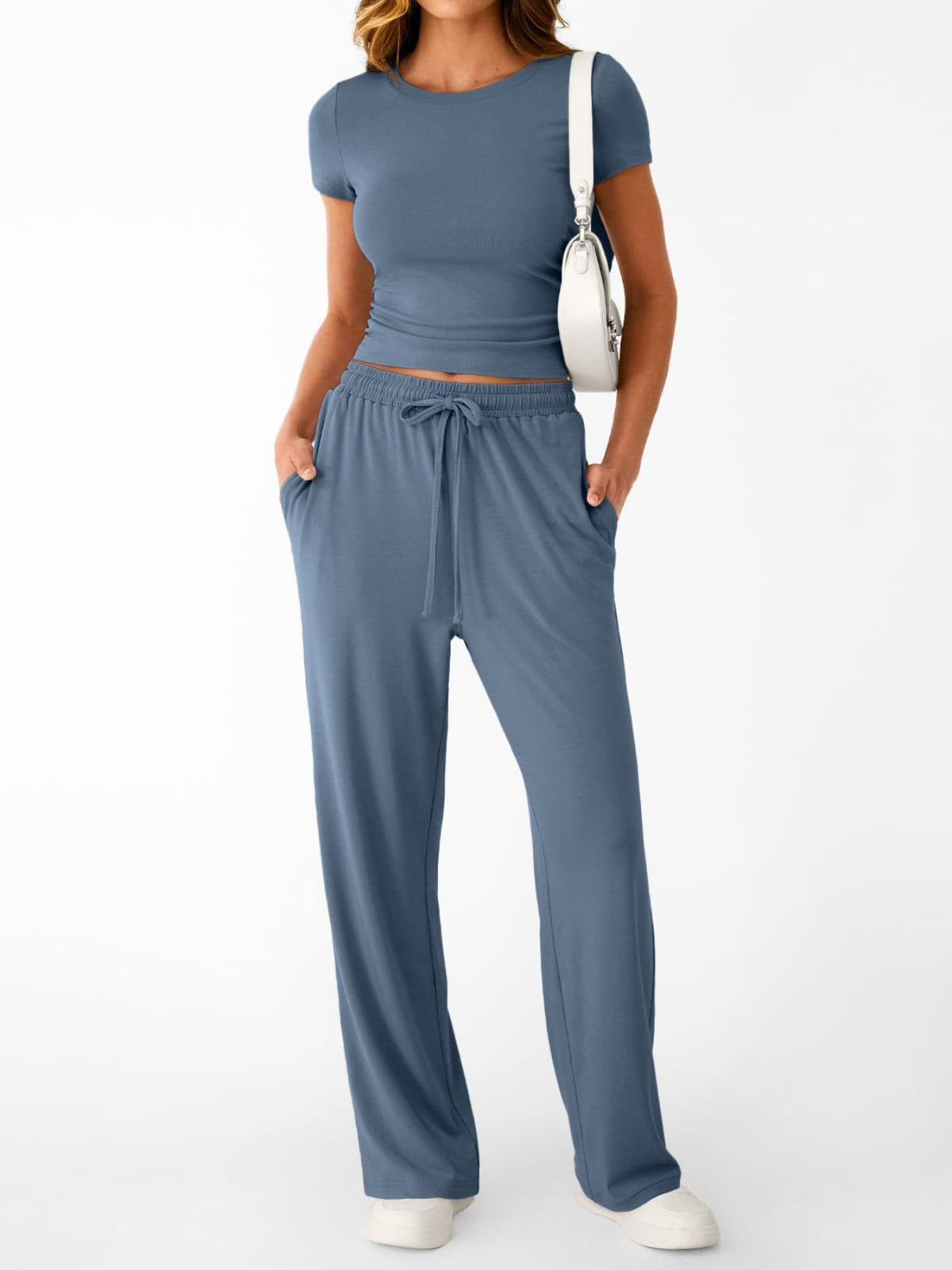 Women's plush fashion hub 2-piece lounge set with round neck short sleeve T-shirt and drawstring shorts, in soft fabric.