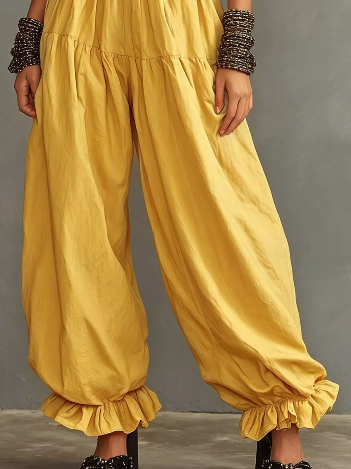 Plus size full smocked ruffle hem wide-leg pants by Plush Fashion Hub, featuring flowing wide legs and ruffled hem detail.