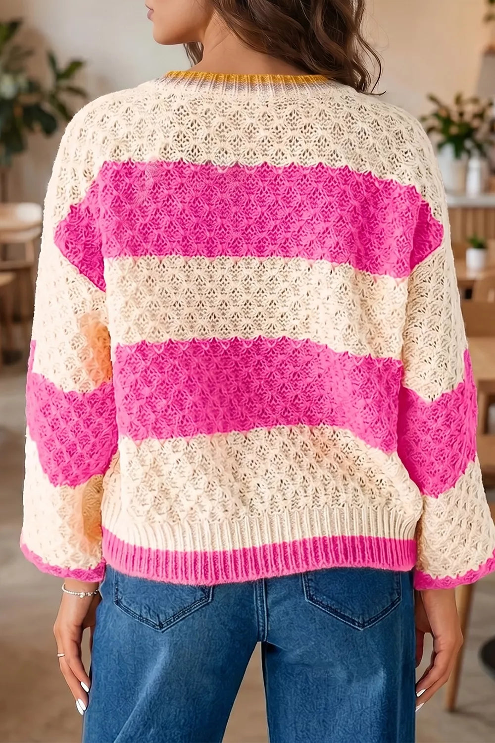 Women's striped colorblock textured drop shoulder sweater by Trendsi, featuring a cozy knit with bold color accents.
