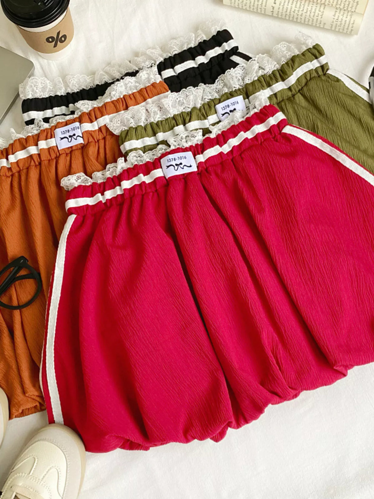 Plush Fashion Hub lace trim elastic waist mini skirt, showing a stylish short skirt with lace details and a comfortable fit.