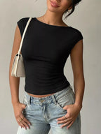 Lace detail cap-sleeve T-shirt from Trendsi, featuring a classic design with delicate lace accents on the sleeves.