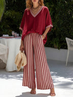 Women's striped tunic top and casual trousers two-piece set by FitiqueFit, featuring a relaxed fit and comfortable fabric.