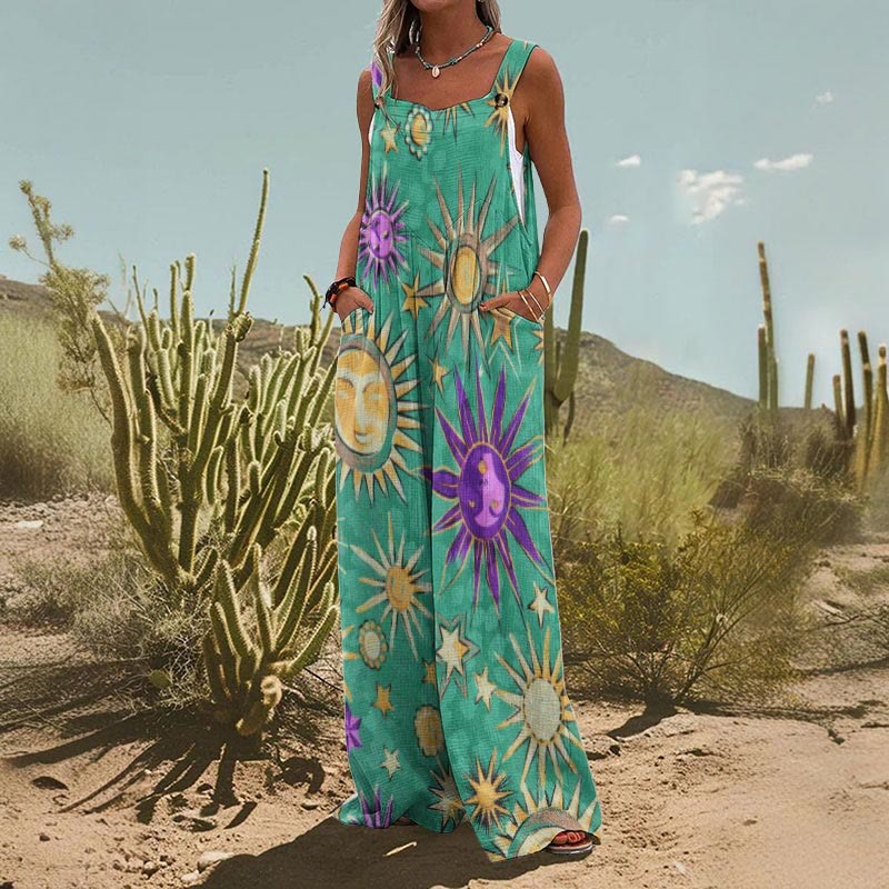 Women’s square-neck floral sleeveless jumpsuit by FitiqueFit, casualwear, shown in a vibrant, patterned design on model.