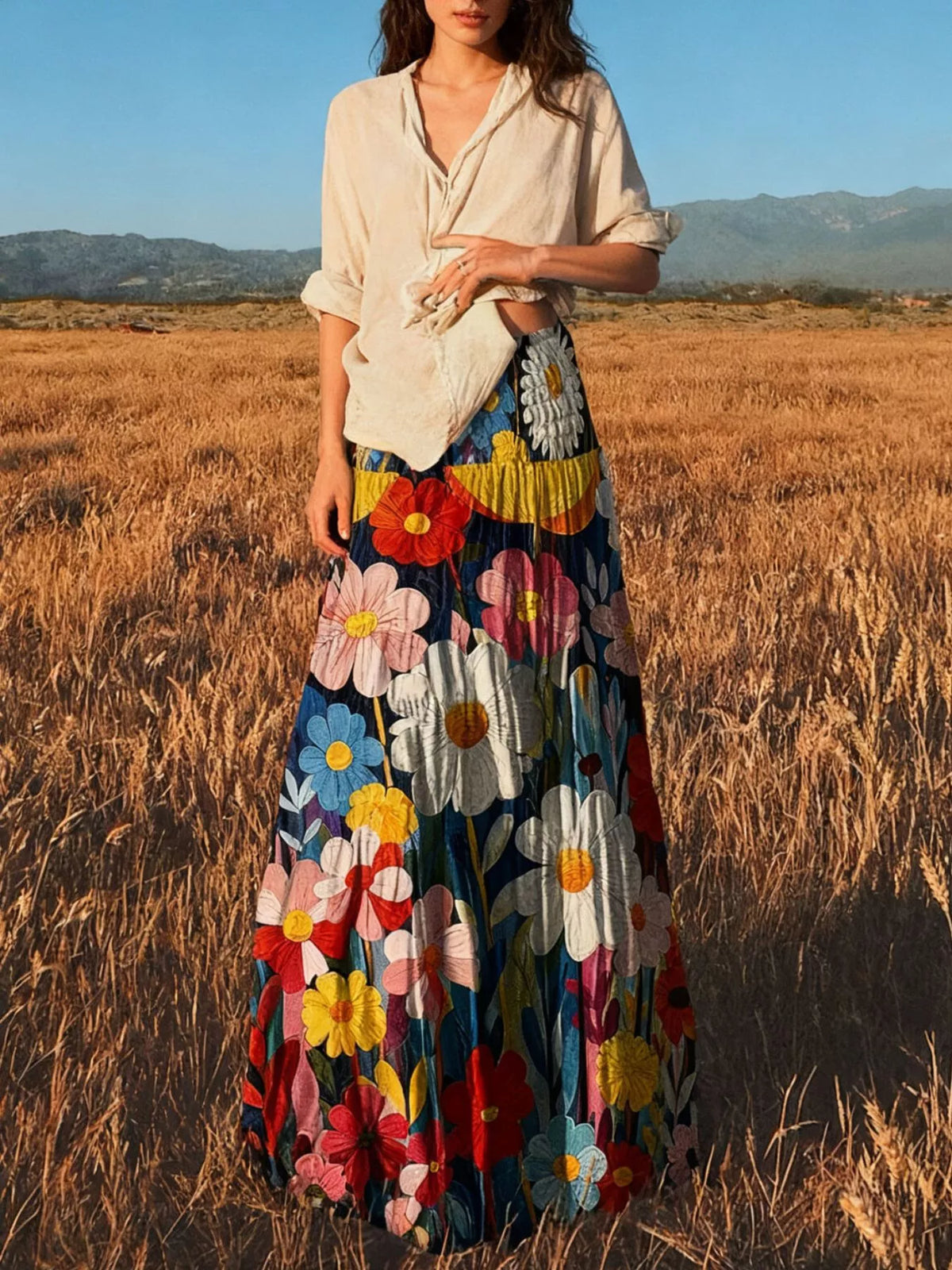 Floral print high-waisted maxi skirt from Trendsi, flowing fabric with vibrant floral design, full length and elegant fit.