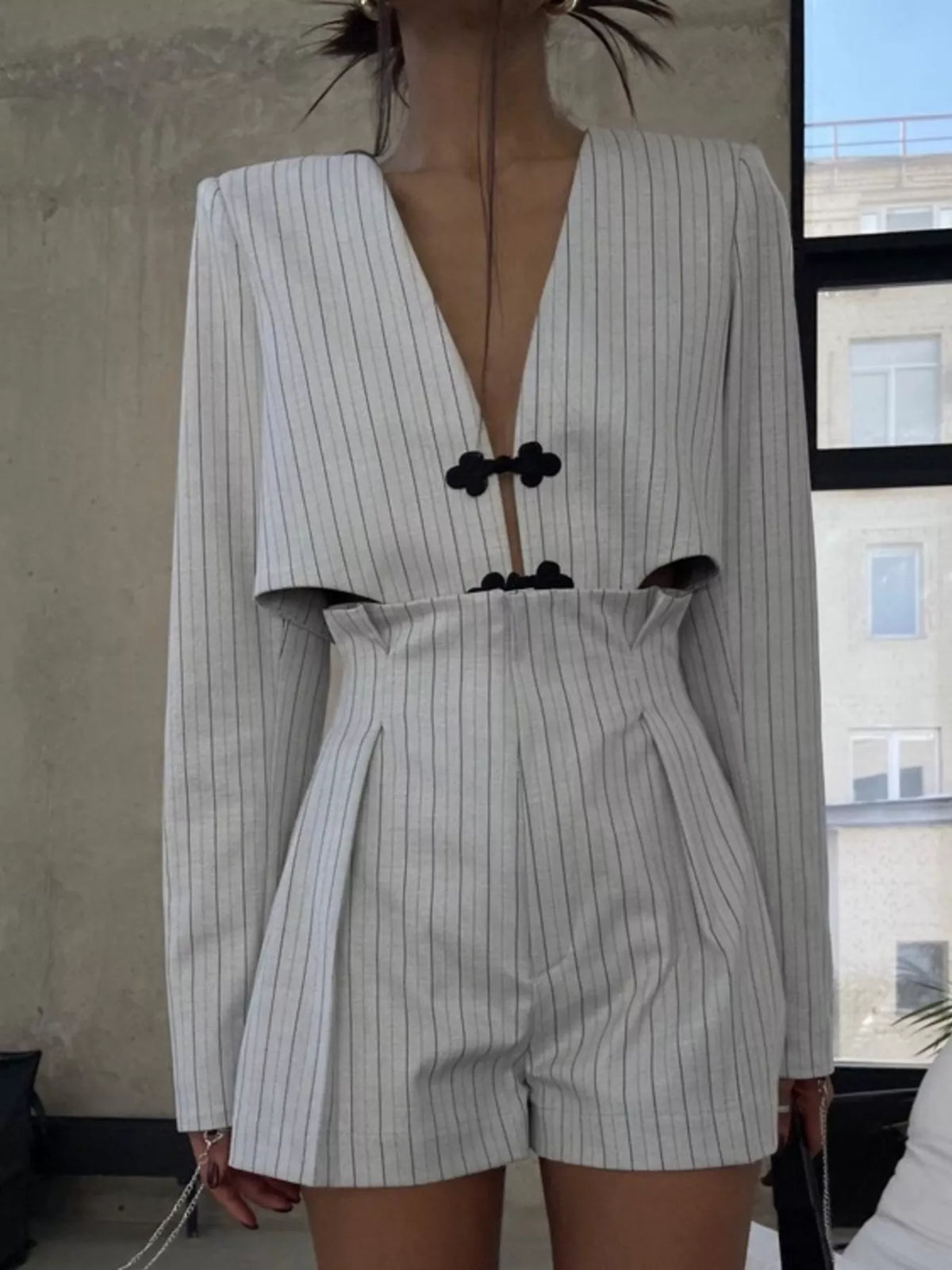 Trendsi pinstripe cropped blazer and pleated shorts set, stylish women's outfit with tailored blazer and matching shorts.