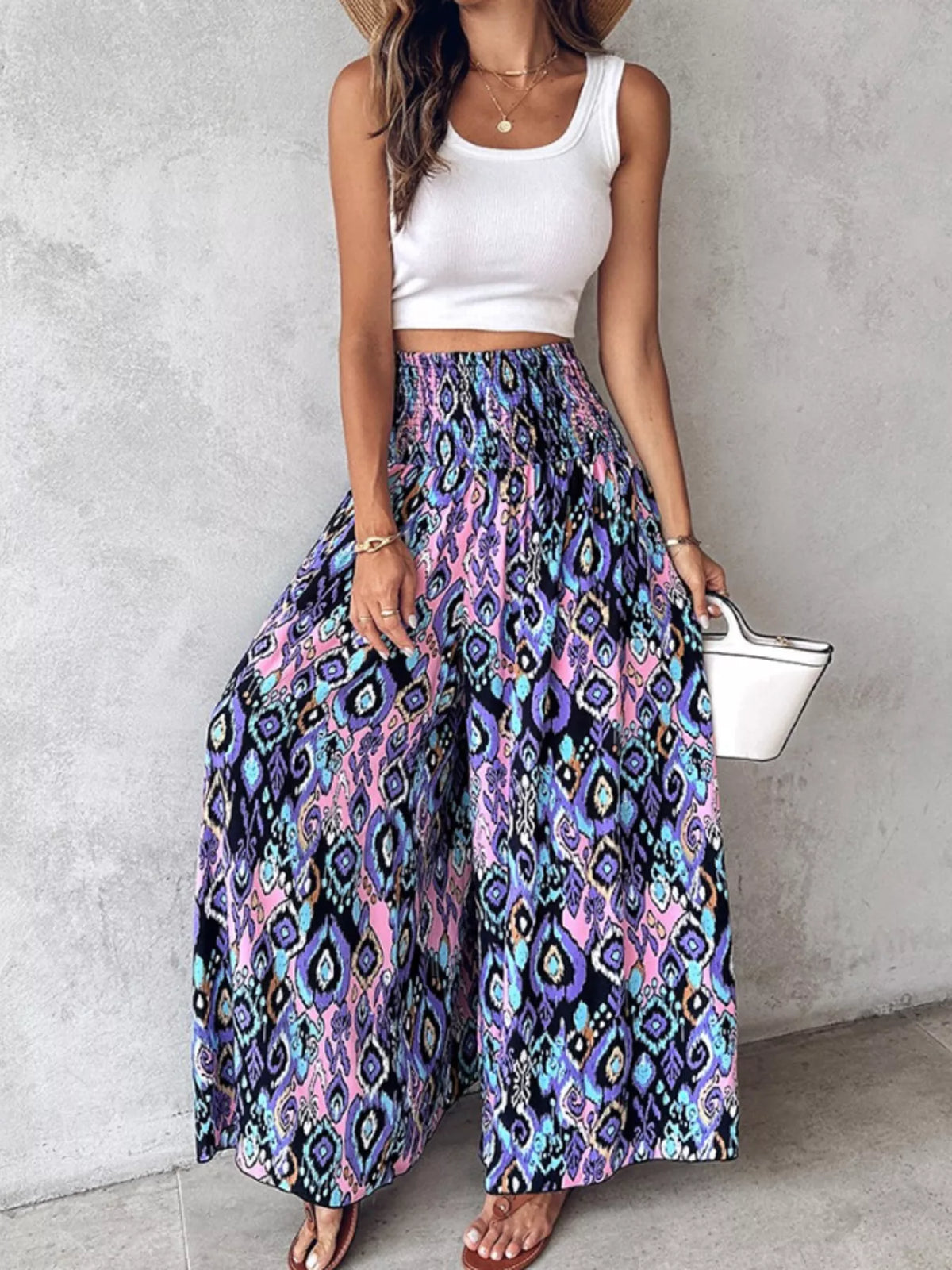 Printed wide-leg pants by Plush Fashion Hub, featuring a relaxed fit and bold pattern, displayed on a model against a neutral background.
