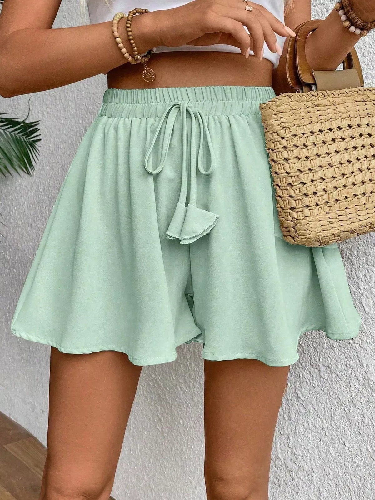 Plush Fashion Hub flowy romper with drawstring waist, lightweight fabric, and relaxed fit, perfect for casual summer wear.