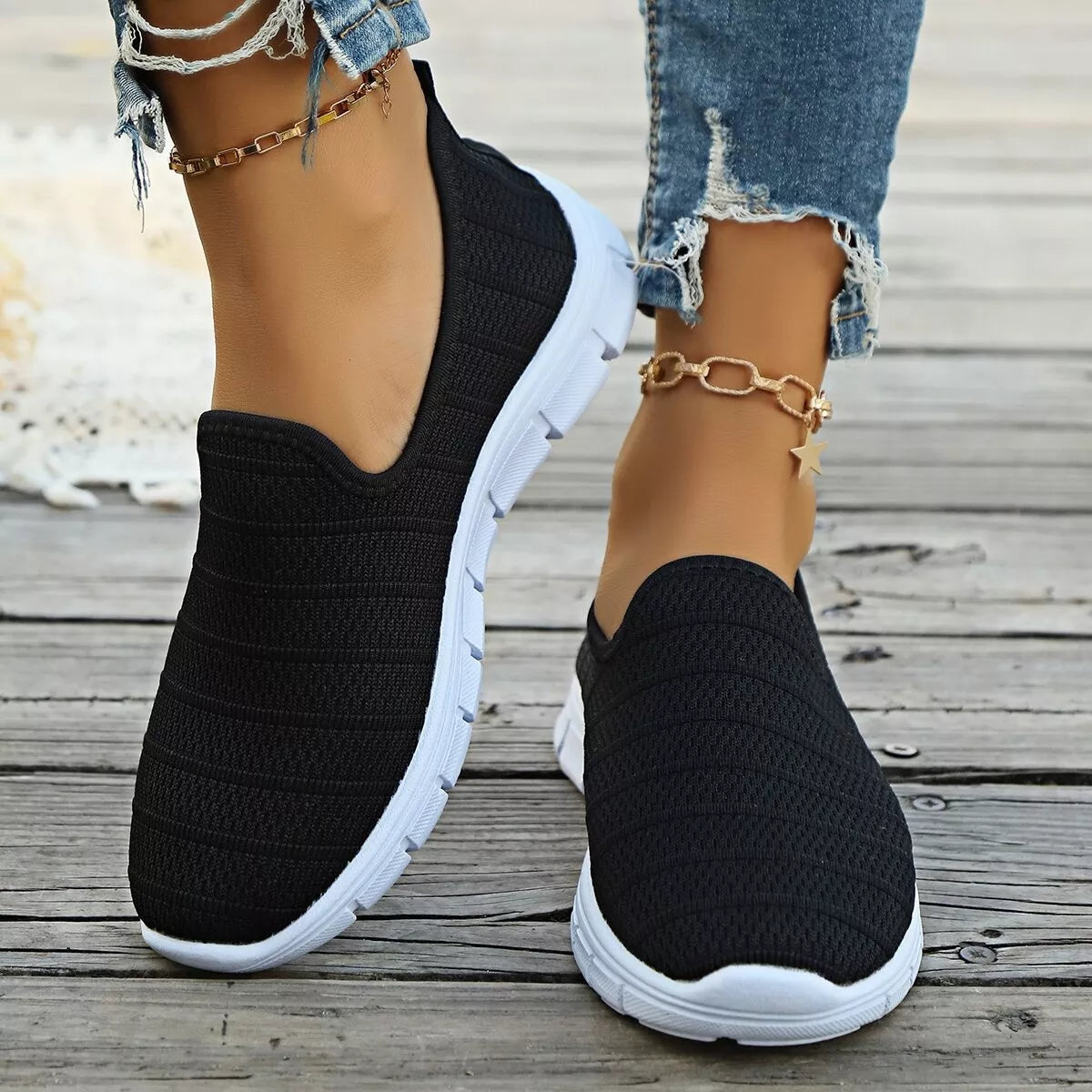 Women’s breathable mesh slip-on casual walking flats from Plush Fashion Hub, lightweight and comfortable shoe with slip-on design.