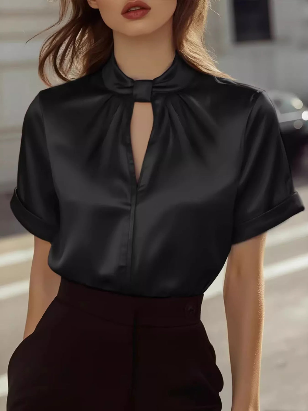 Plush Fashion Hub satin keyhole short sleeve blouse featuring a stylish design and smooth fabric, shown in the image.