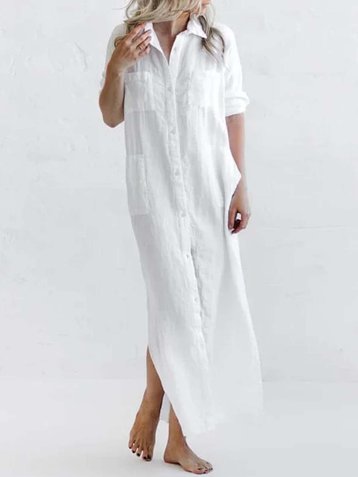 Plus size casual button-down maxi shirt dress by Trendsi, featuring a relaxed fit, long sleeves, and full-length design.