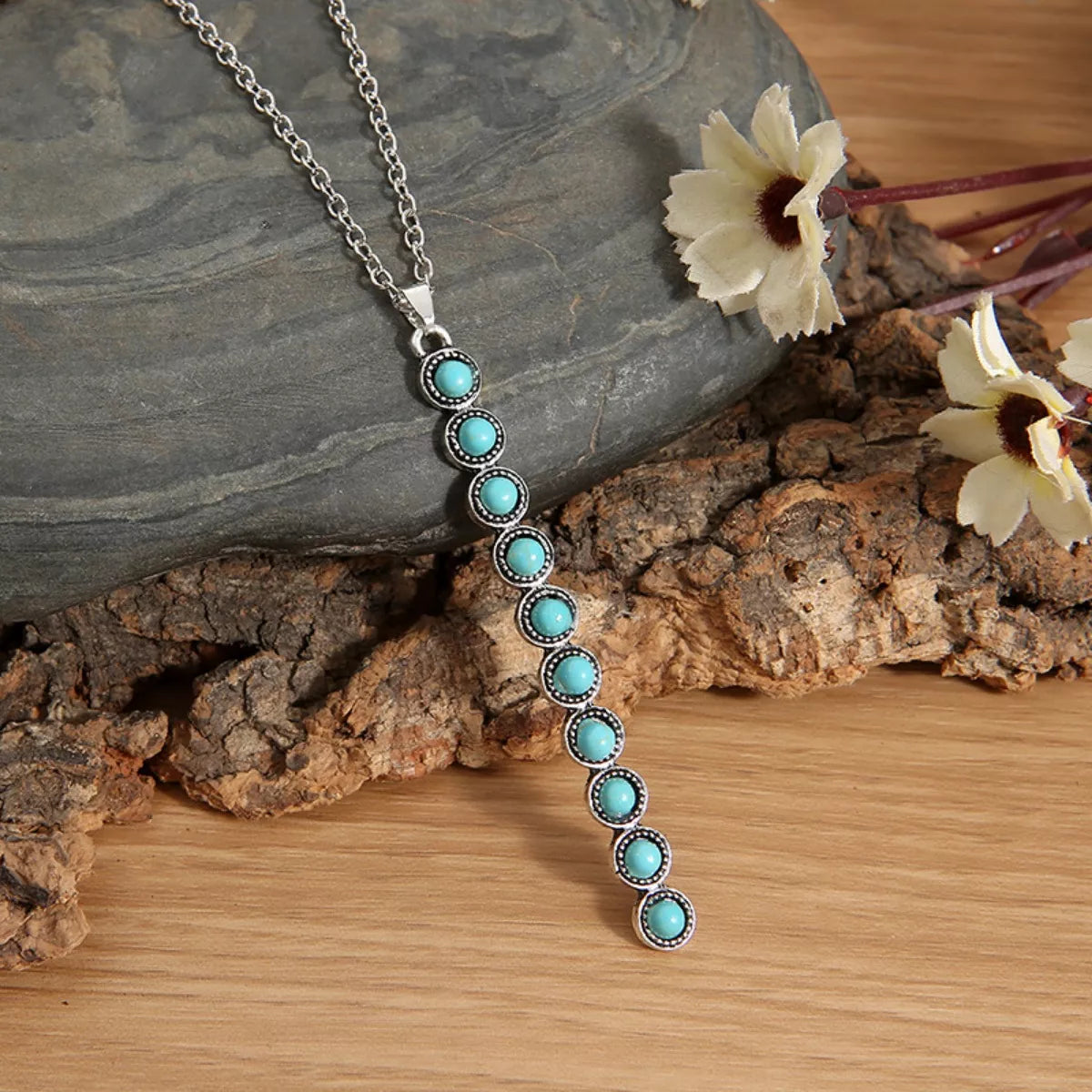 Vintage style beaded bar necklace from Plush Fashion Hub featuring colorful beads and a sleek bar pendant.