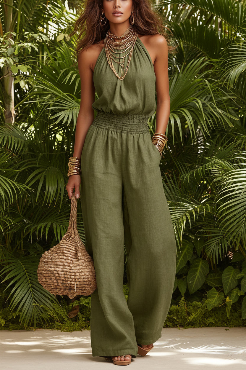 Women's black halter-neck backless wide-leg jumpsuit by Plush Fashion Hub, stylish streetwear with a solid color design.