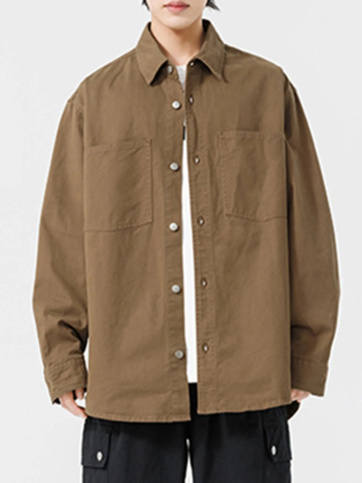 Men's long sleeve button-up shirt by Trendsi, shown in a casual, stylish fit with a classic collar and button details.