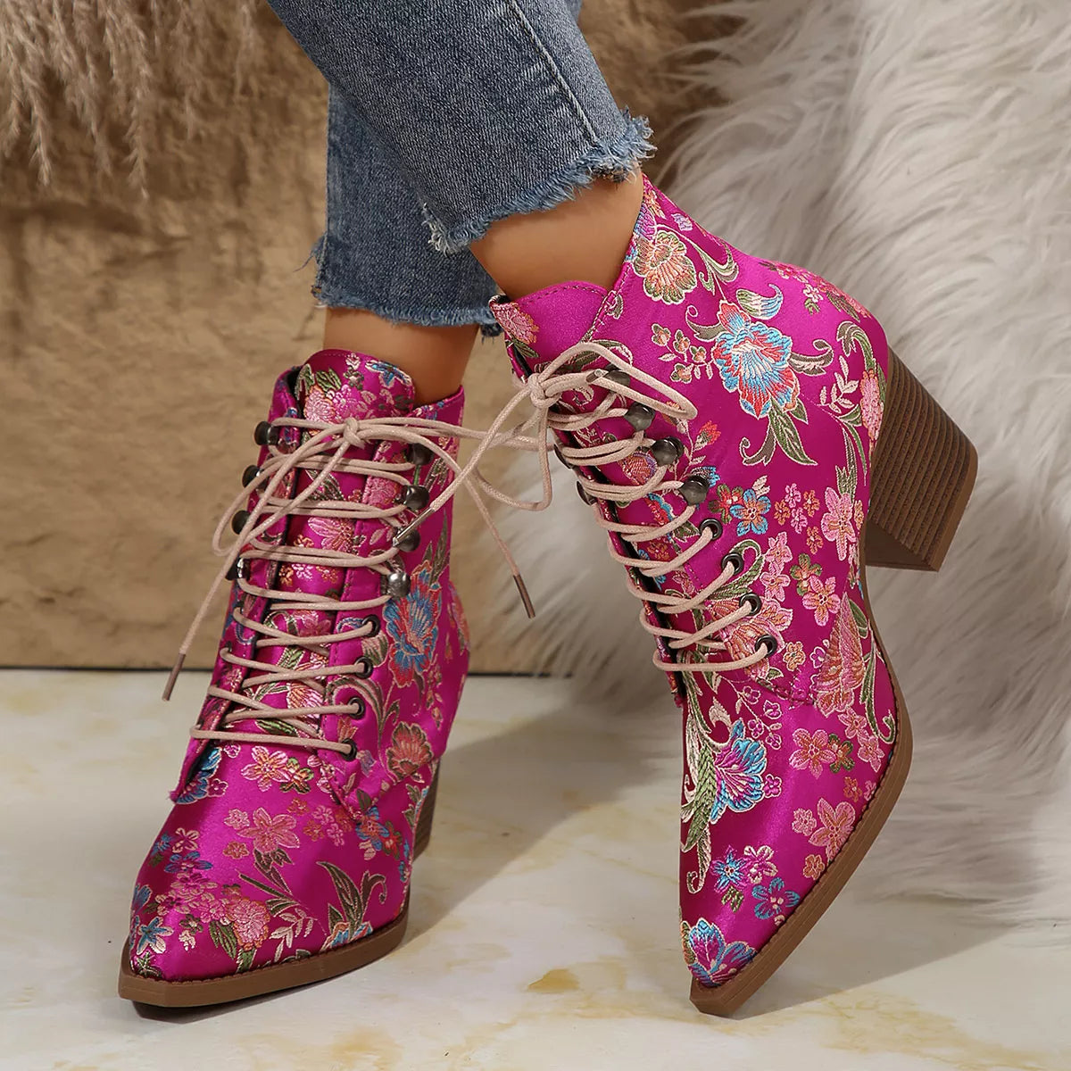 Point toe block heel boots by Trendsi, stylish footwear with a sleek design and sturdy block heel, perfect for modern outfits.