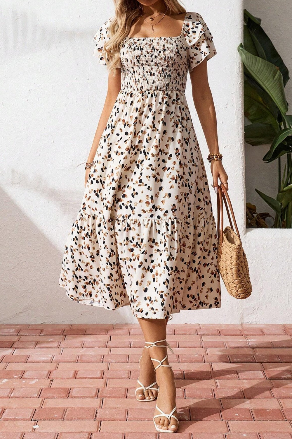 Women's square neck ruffle sleeve smocked midi dress in cotton blend, featuring a fitted bodice and flowing skirt.