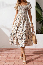 Women's square neck ruffle sleeve smocked midi dress in cotton blend, featuring a fitted bodice and flowing skirt.