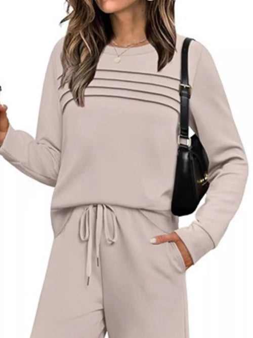 Plus size Trendsi casual long sleeve crewneck top and drawstring pants set, comfortable and stylish for everyday wear.
