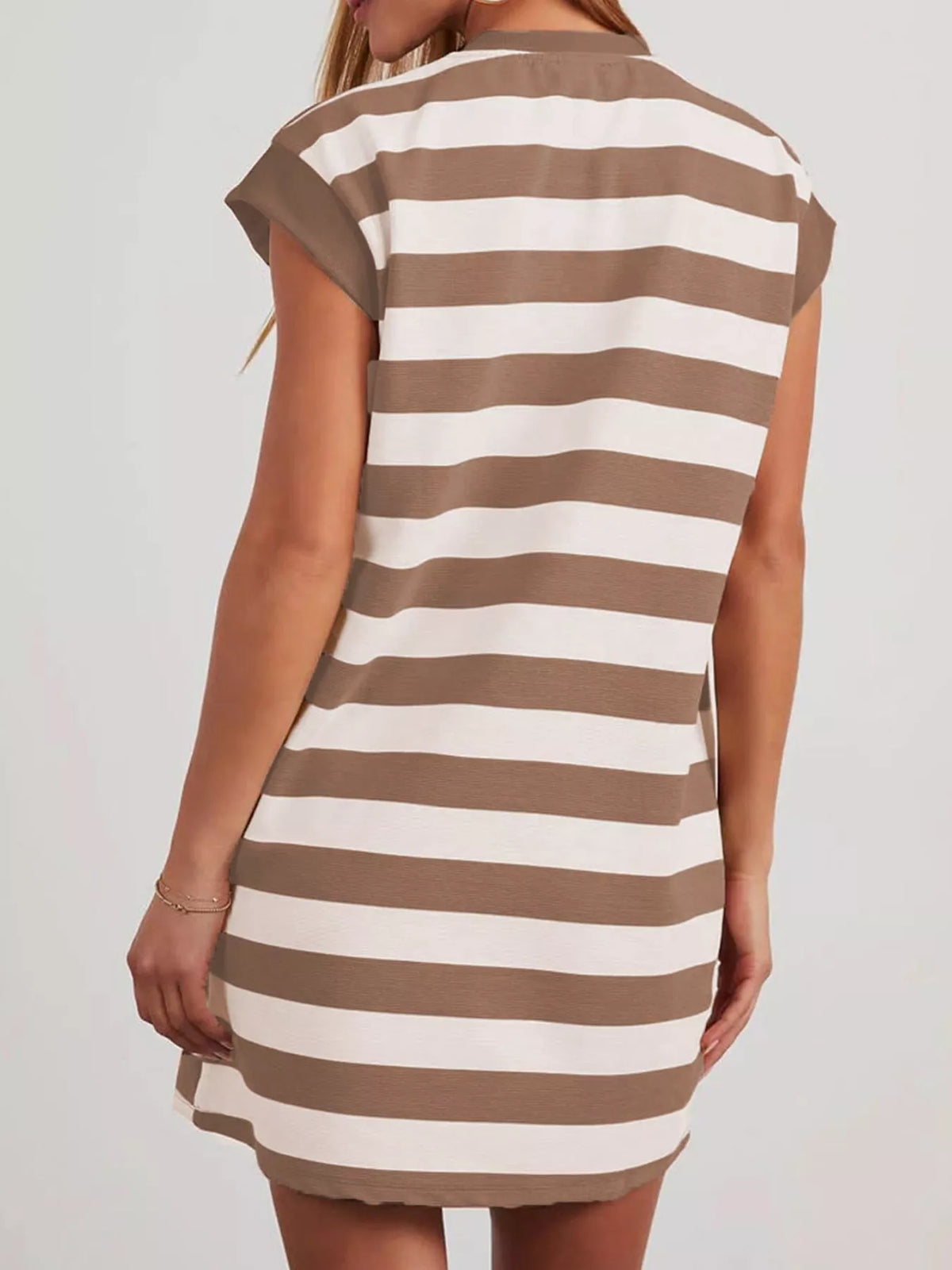 Plus size casual striped short sleeve mini dress by Plush Fashion Hub, front view showcasing relaxed fit and colorful pattern.