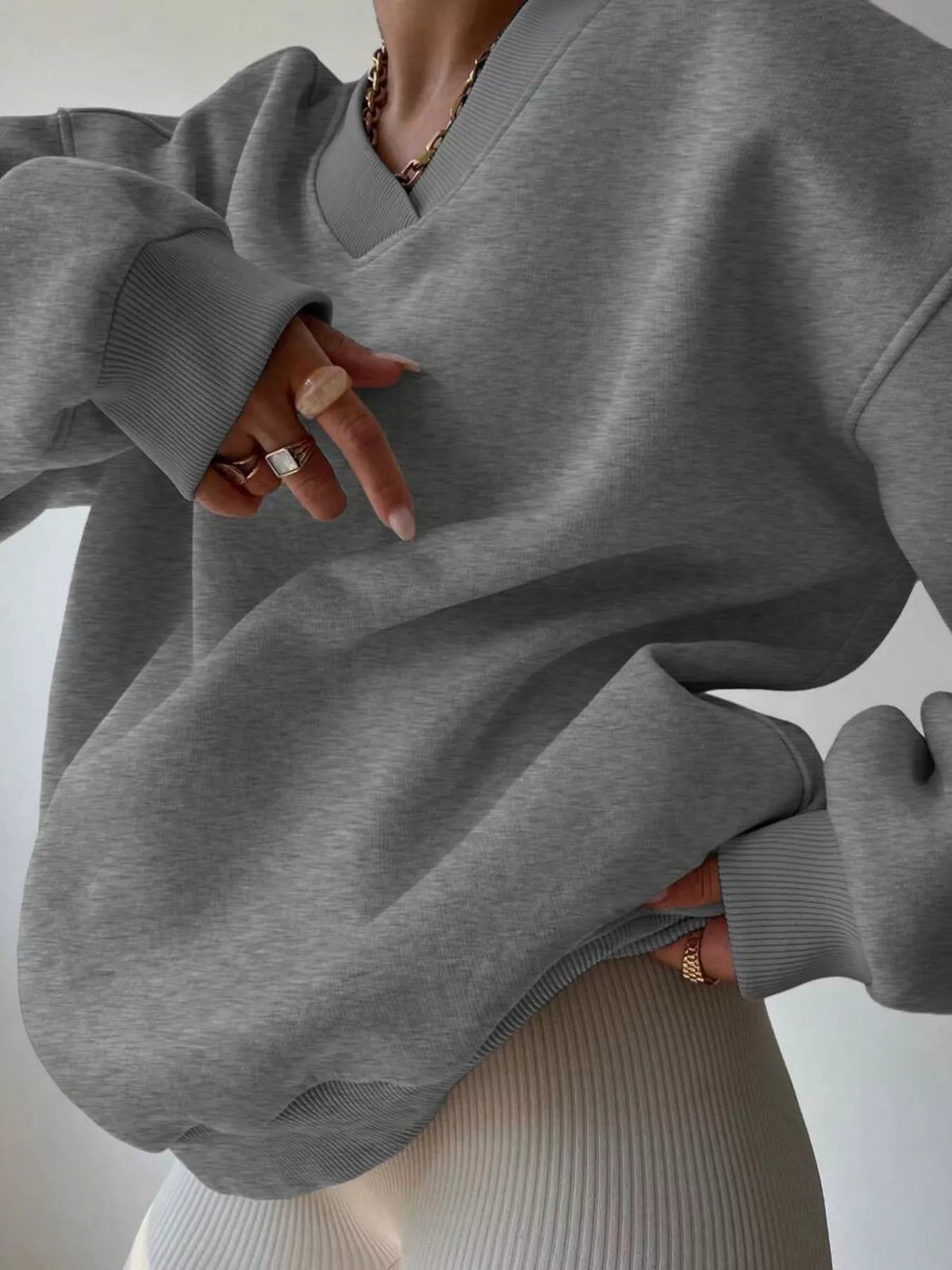 Pink dropped shoulder long sleeve oversized sweatshirt from Trendsi, featuring a relaxed fit and cozy fabric.