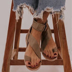 Plus size Roman style women's buckle toe slippers by LadyShow.Store featuring flat sandals with buckle detail and open toe design.