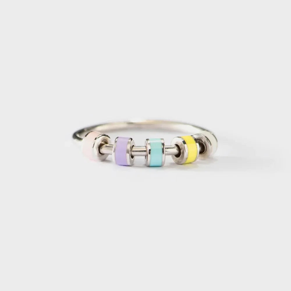 Sterling silver oil drip ring featuring a sleek, modern design, designed by Plush Fashion Hub.