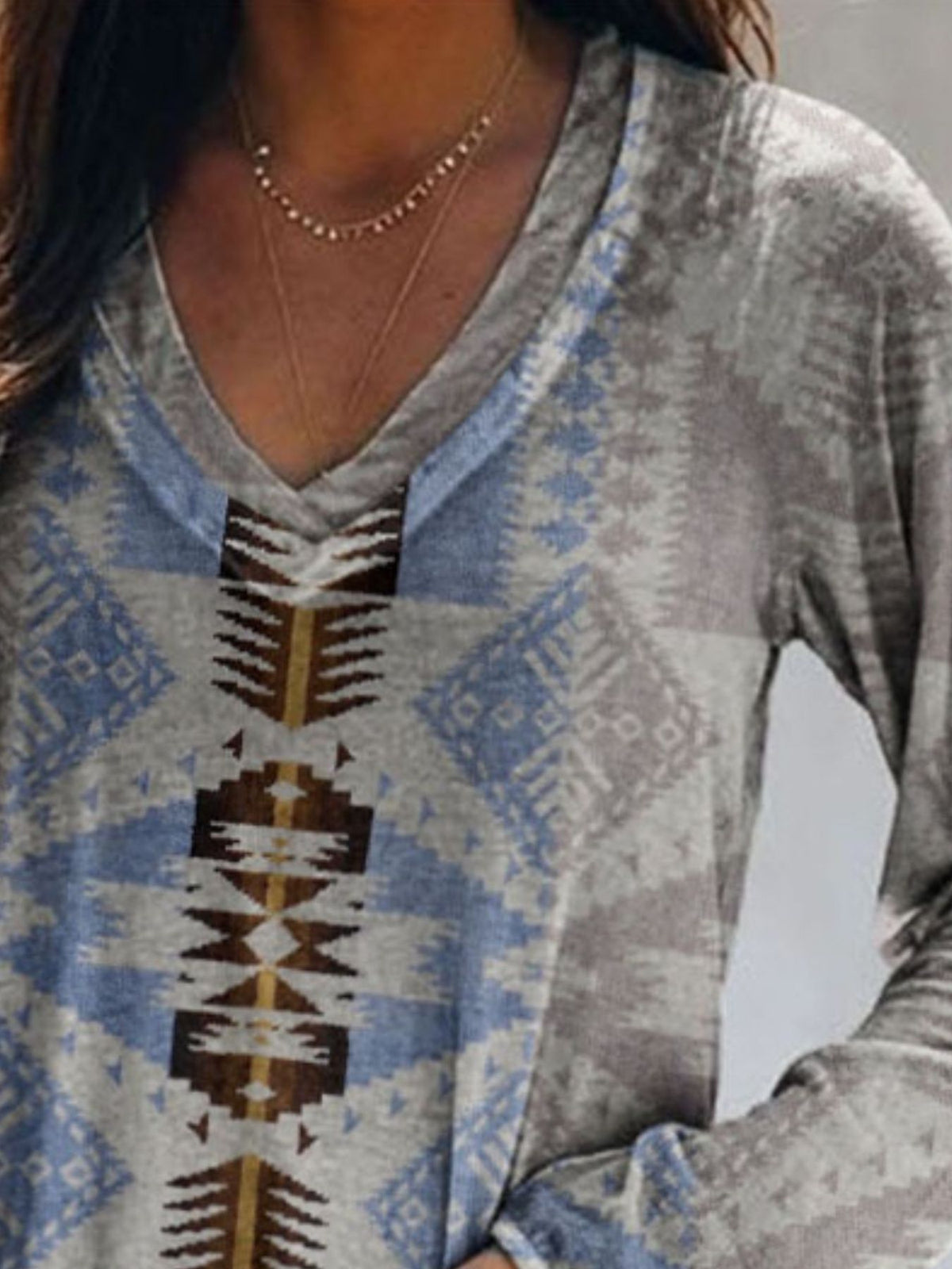 Plus size Plush Fashion Hub geometric print V-neck long sleeve T-shirt with casual style, featuring a modern geometric design.