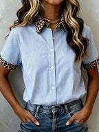 Women's leopard print short sleeve dress with contrast collar by Trendsi, featuring a stylish and trendy animal print design.