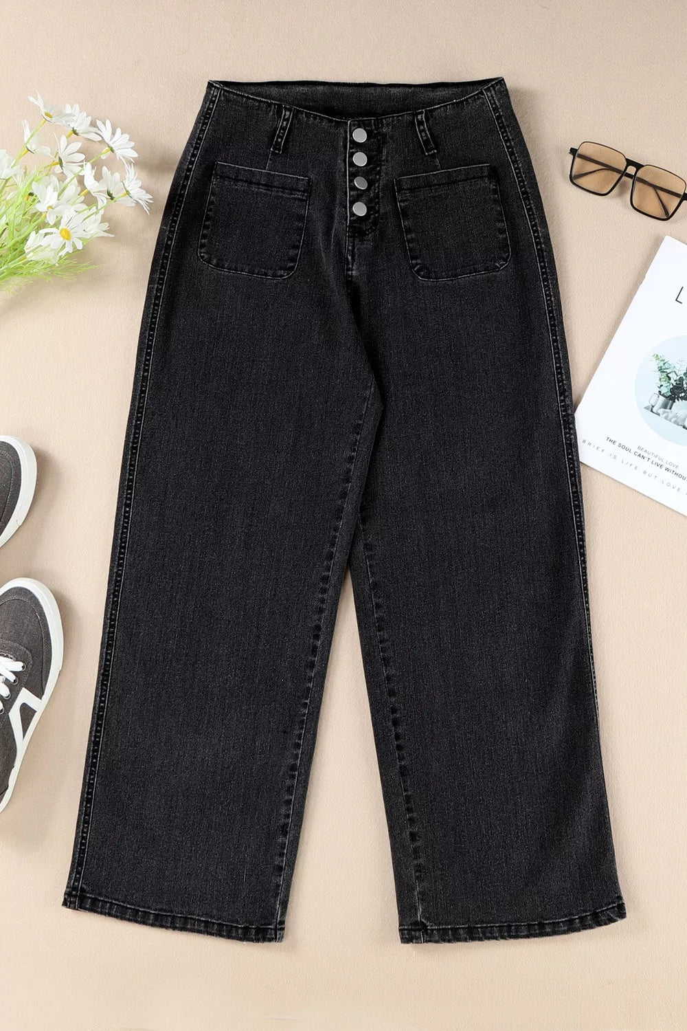 Plush Fashion Hub high-waisted wide-leg jeans with button-fly, showcasing denim fabric and relaxed fit.