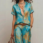 Women's Bohemian printed resort two-piece set by FitiqueFit featuring a 3/4 sleeve shirt and matching pants in casualwear style.