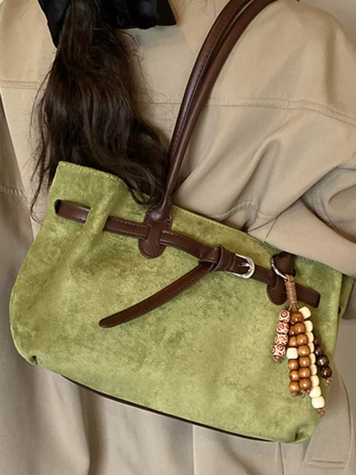 Vintage suede tote bag by Plush Fashion Hub, showcasing a stylish, soft suede exterior with sturdy handles and spacious interior.