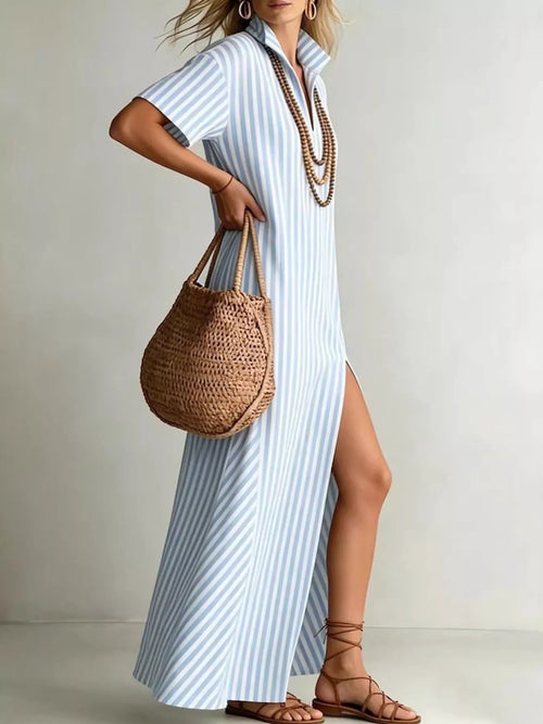 Full size striped maxi dress with side slit from Trendsi, featuring a flowing fabric and bold pattern.