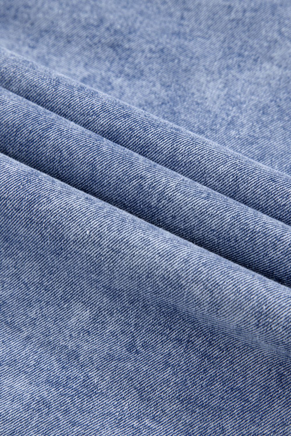 Raw hem button-down long sleeve denim dress by Plush Fashion Hub, featuring a relaxed fit and casual style.