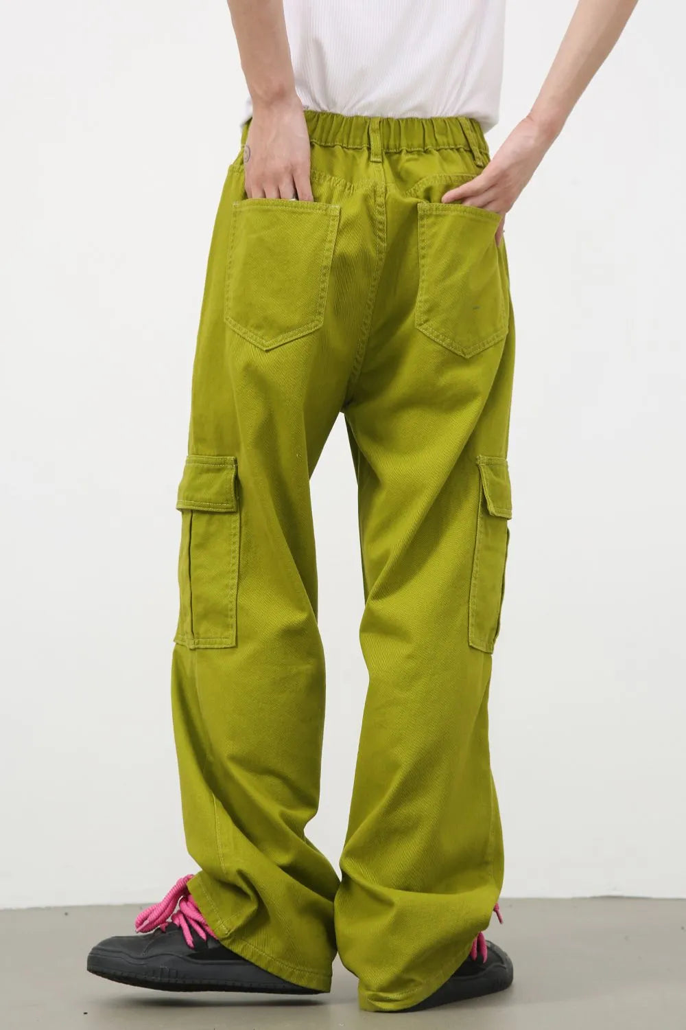 Men's mid-rise cargo pocket jeans by Plush Fashion Hub, showing dark denim fabric with multiple cargo and front pockets.