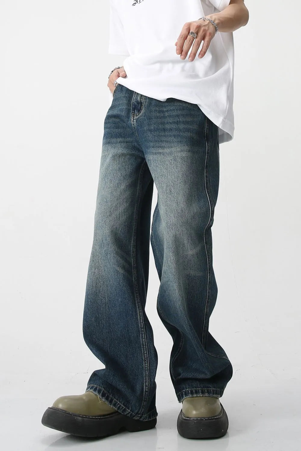 Plush Fashion Hub bootcut denim jeans with front and back pockets, classic blue wash, and relaxed fit style.
