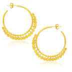 14k yellow gold hoop earrings with dangling sequin accents, stylish jewelry by Bids.com, shown on a neutral background.