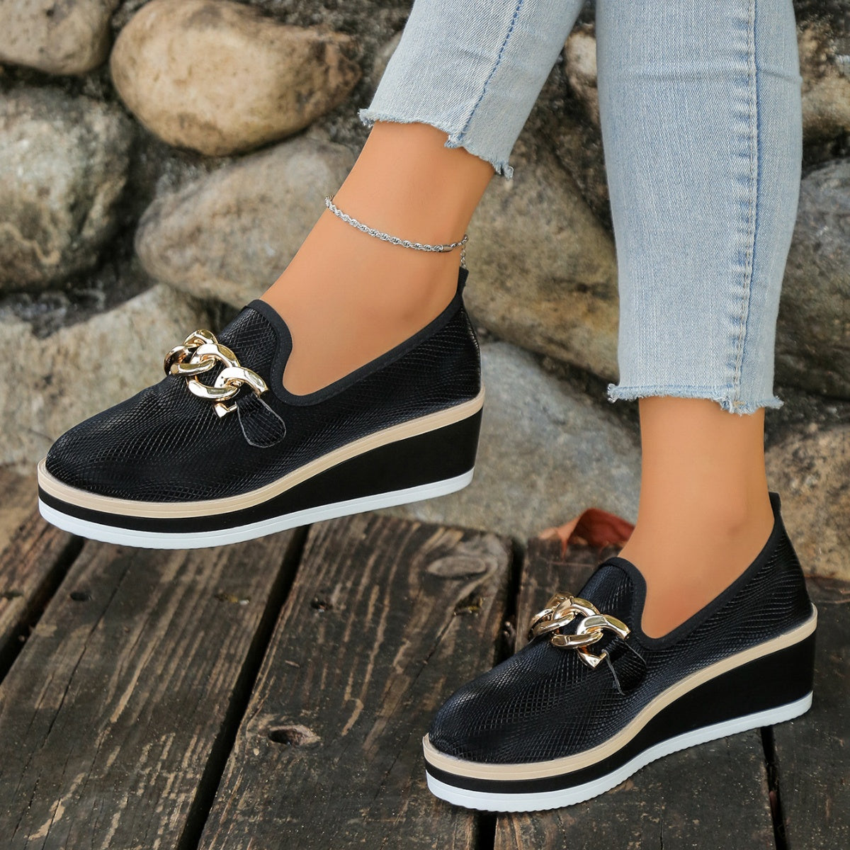 Chain decor wedge loafers by Trendsi, stylish footwear with a comfortable wedge heel and chain embellishment, perfect for casual wear.