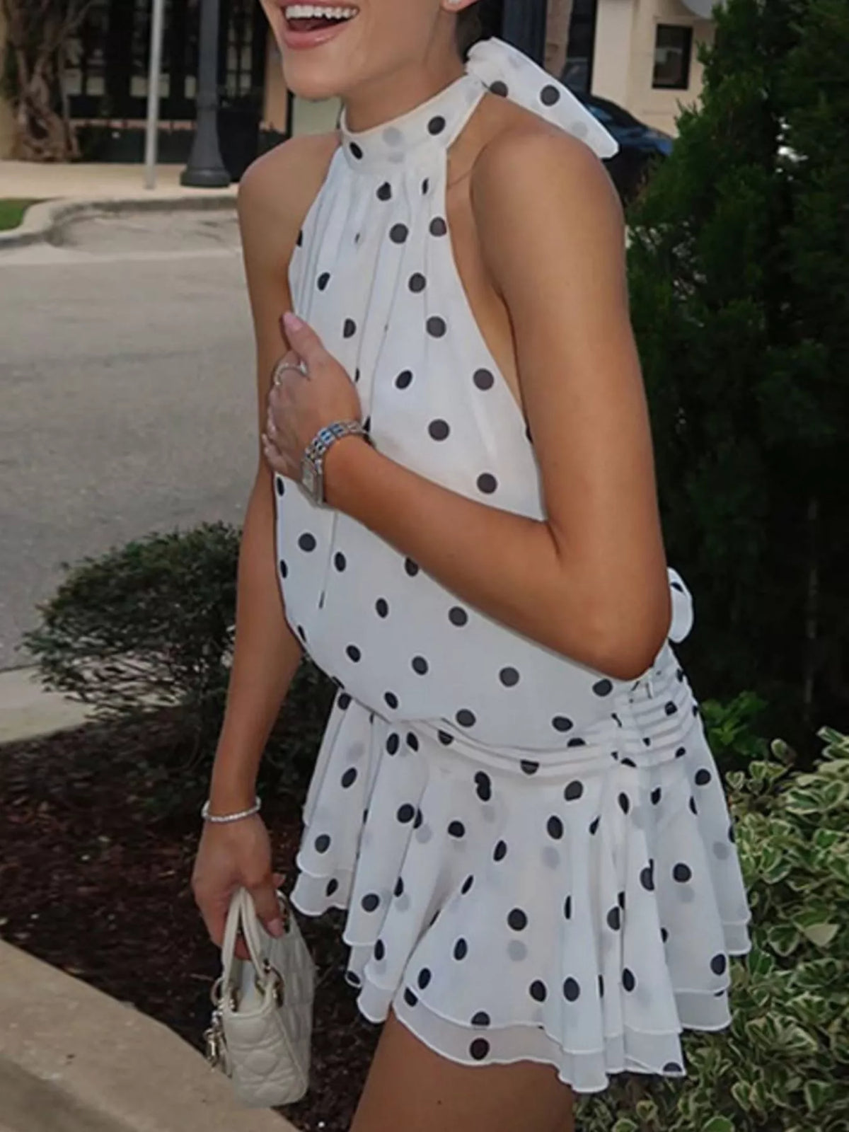 Polka dot halter neck ruffle dress by Plush Fashion Hub featuring a playful, feminine design with ruffled details and a halter neckline.