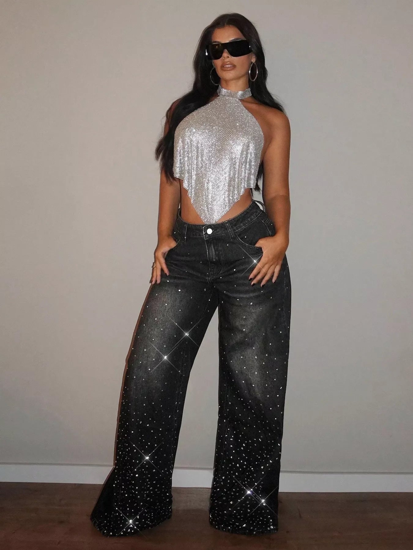 Rhinestone wide-leg jeans from Trendsi featuring embellished rhinestones on denim bottoms with a relaxed fit.