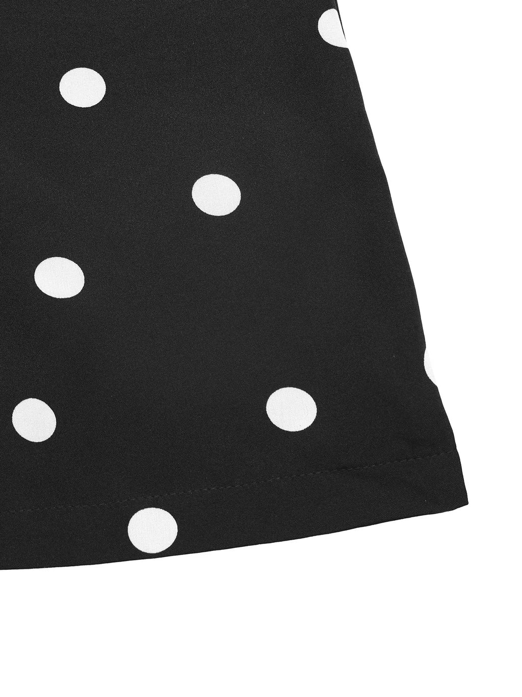 Flowy black and white polka dot strapless jumpsuit with wide legs, stylish and comfortable fashion by Trendsi.