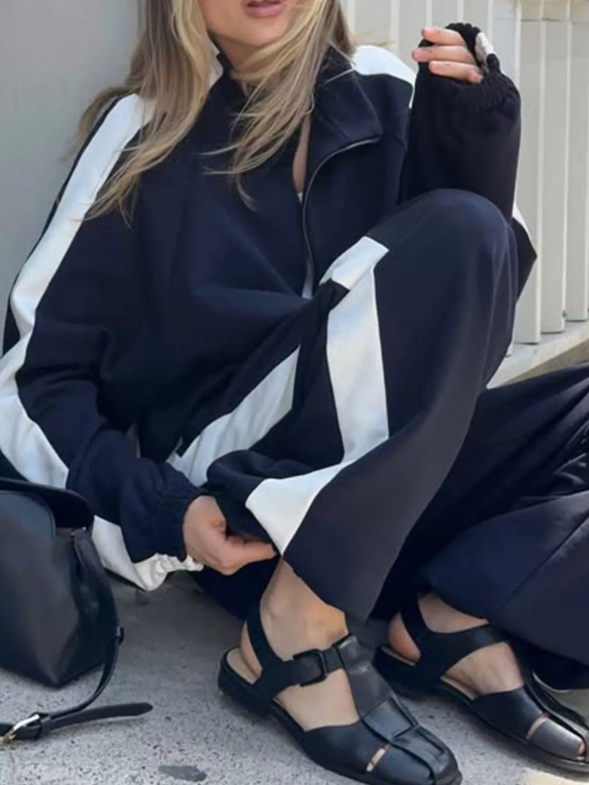 Plush Fashion Hub zip-up long sleeve tracksuit set with a comfortable fit, featuring a hoodie and matching pants in soft fabric.