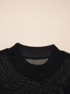 Women's sheer mesh patchwork cap sleeve t-shirt by Trendsi, showcasing elegant layering top with intricate mesh and patchwork design.