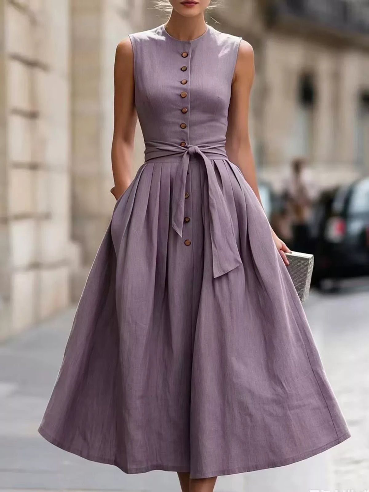 Plus size sleeveless button-front belted midi dress from Trendsi, featuring a stylish design and full-size fit.