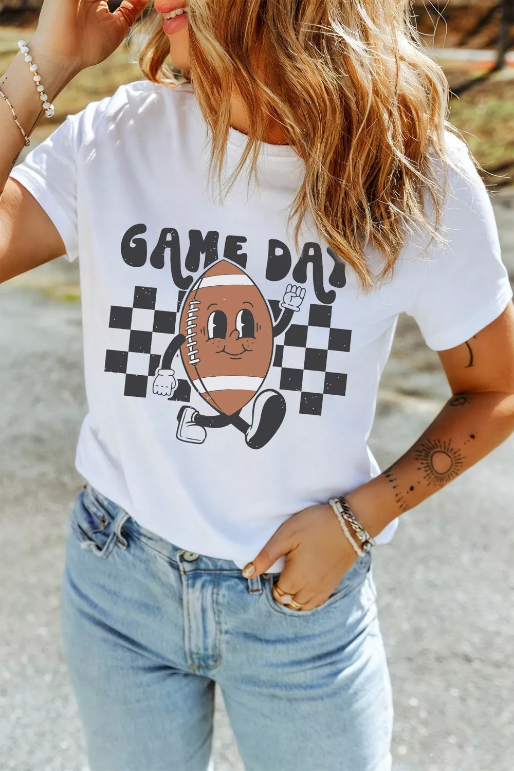Plush Fashion Hub Game Day football graphic T-shirt, casual tops featuring bold football design for sports fans.