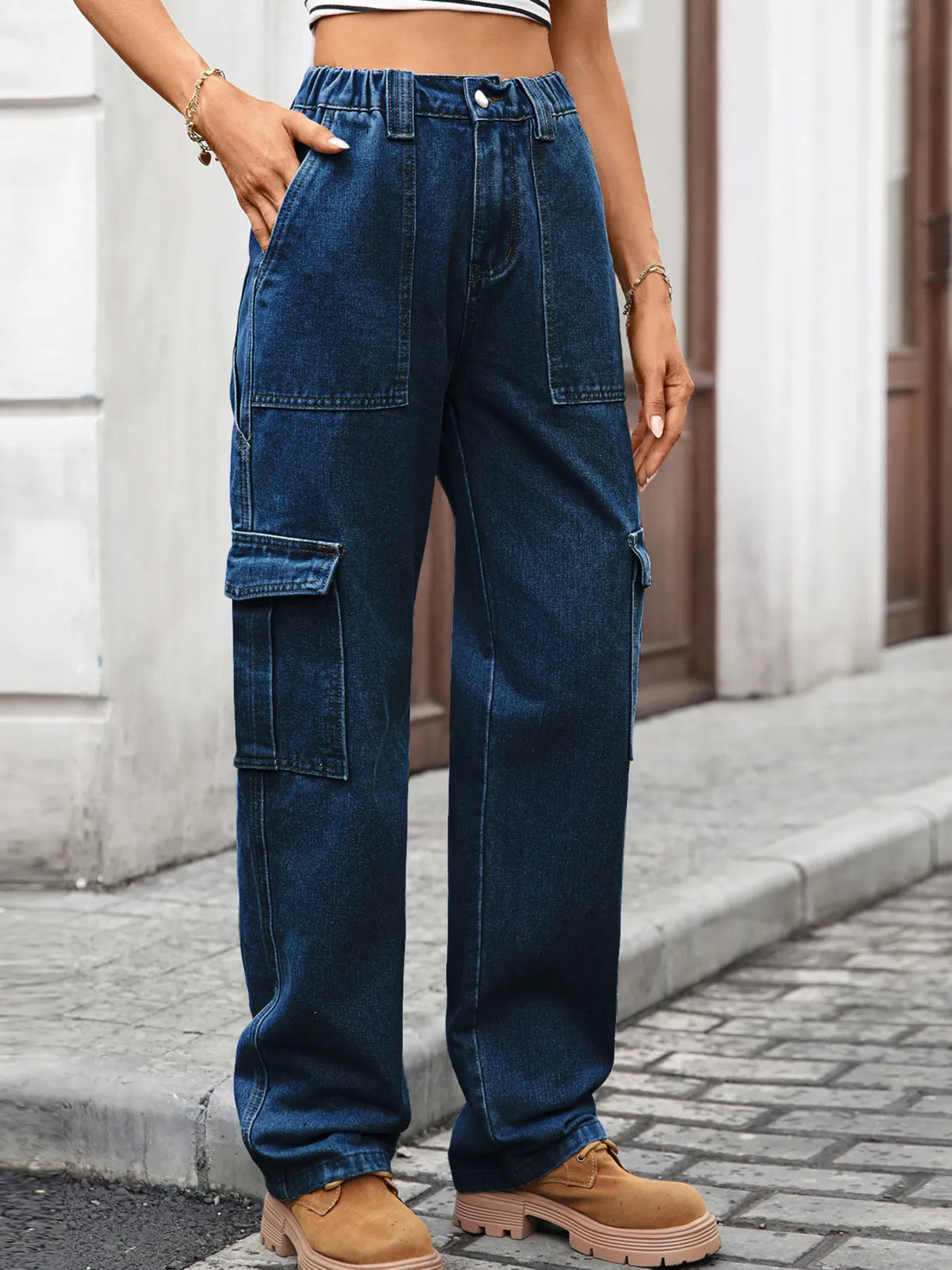 High-waisted cargo denim jeans by Plush Fashion Hub featuring multiple pockets and a relaxed fit.